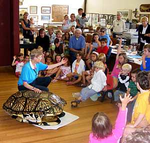 Outreach program with giant turtle shell
